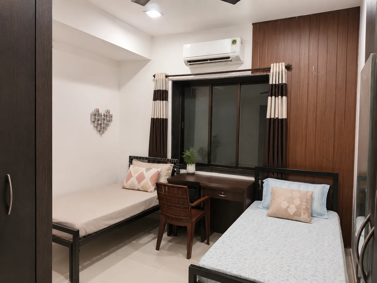 Furnished twin room at Nagindas Mansion in Girgaon