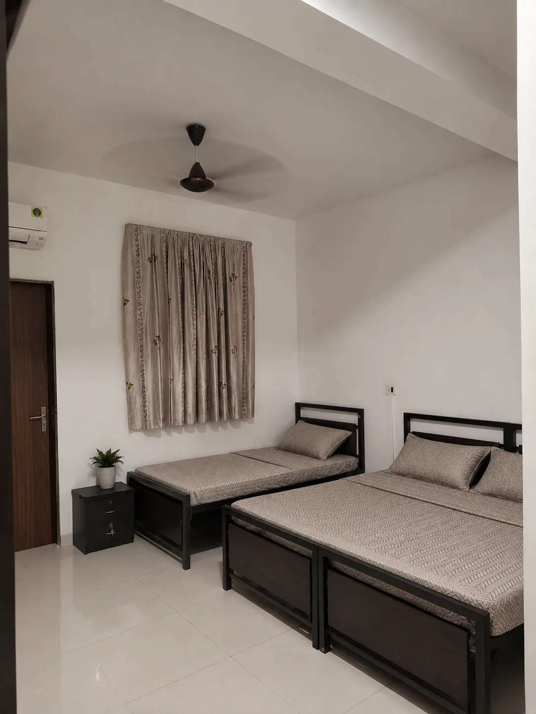 Spacious shared room at Nagindas Mansion girls accommodation